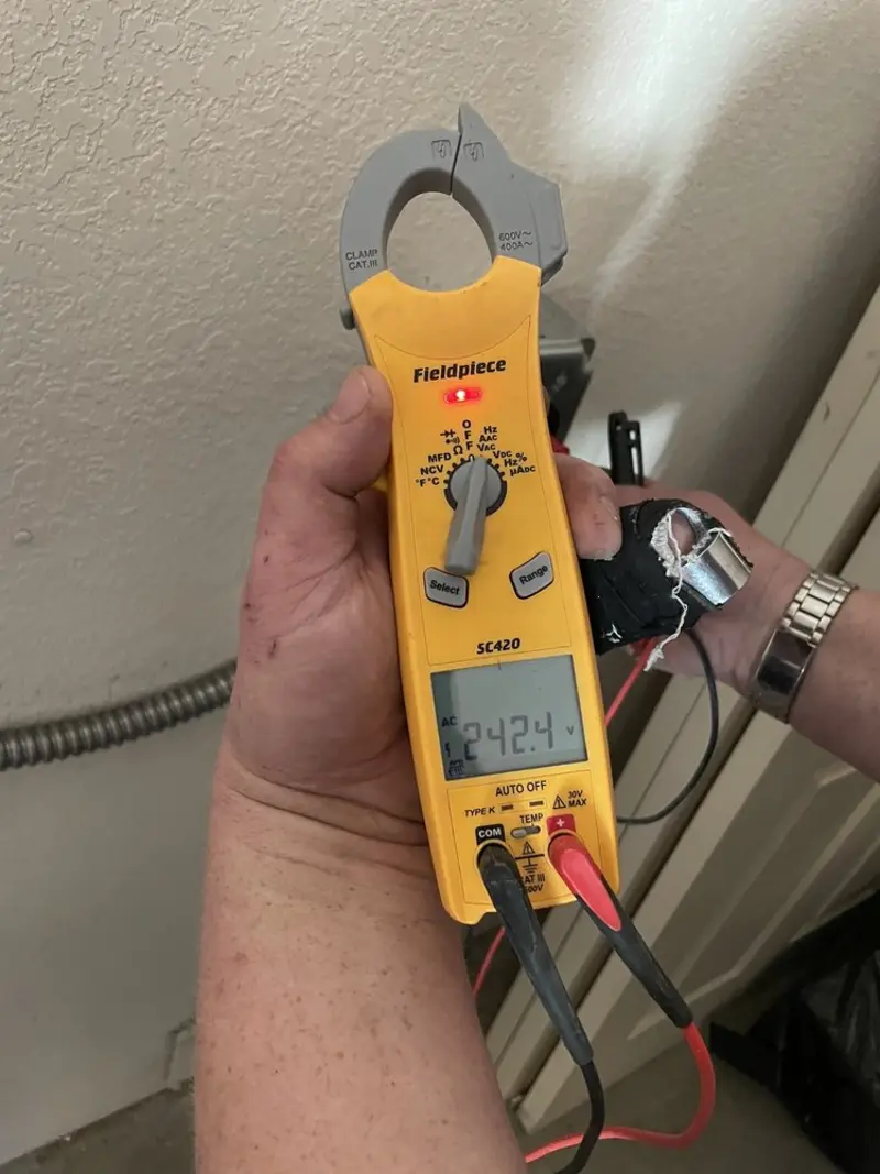 Voltage testing with clamp meter during Aluminum Wiring Replacement in Gustine